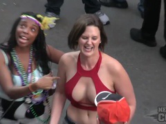 KiloVideos presents: Mardi gras girls flashing their tits for beads