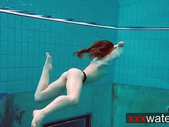 KiloVideos presents: Pierced teen swimming