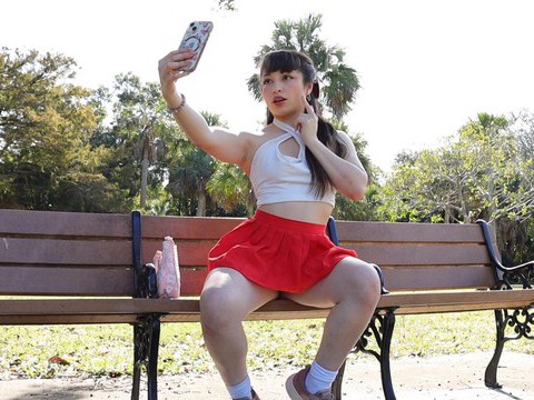 KiloVideos presents: Gorgeous solo college babe doing striptease in a park - pixie