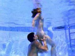 KiloVideos presents: Cute girl sucks cock in the pool