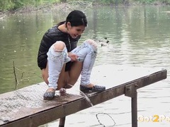 KiloVideos presents: Public pissing girl in jeans goes in two places