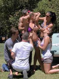 KiloVideos presents: Three naughty girls gets banged outdoors in group sex game