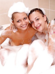 KiloVideos presents: Naughty sexy young chicks taking a hot bubble bath together