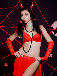 KiloVideos presents: Only one look in the eyes of this fantastic slim teen will tell that she is a little devil inside. No further costume is needed.