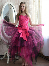 KiloVideos presents: Gorgeous teen cutie stripping an evening dress and showing body in front of a big mirror.