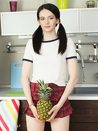 KiloVideos presents: Watch this extremely sexy brunette girl as she reveals her beautiful shaved pussy while posing on the floor.