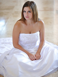 KiloVideos presents: Busty glamorous amateur Danielle models wedding gown indoors & by the pool