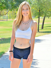 KiloVideos presents: Sporty blonde babe Dakota strips her clothes and flaunts her hot body outdoors